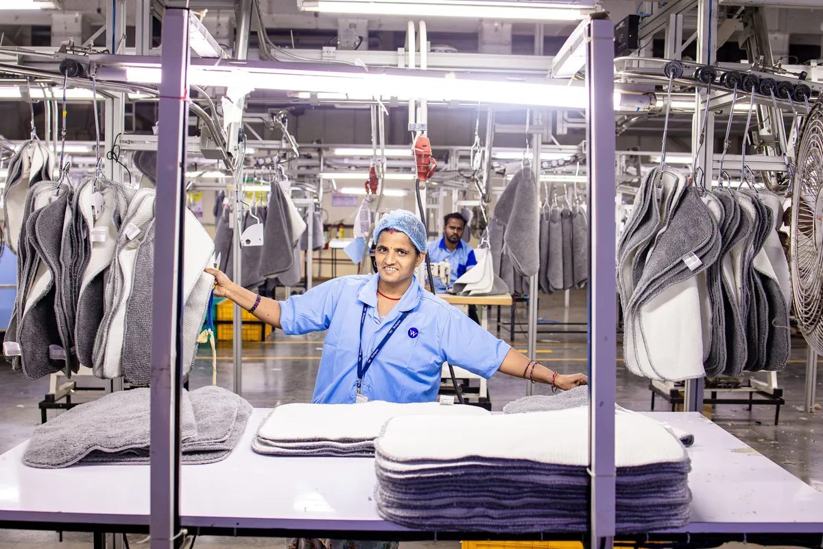 Workers checking products inside a real manufacturing unit