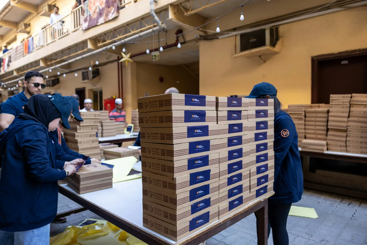 A real team checking packed products and work details